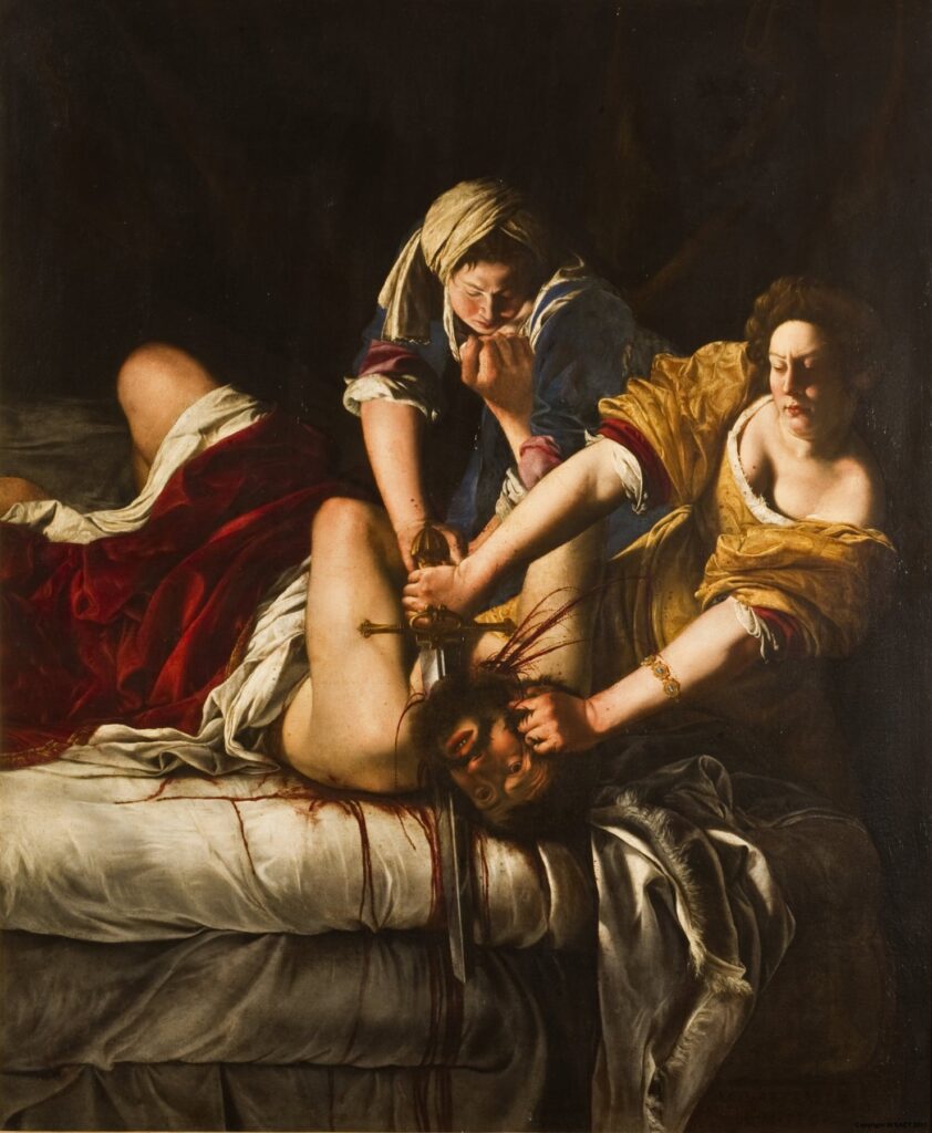 Artemisia Gentileschis Judith im goldgelben Kleid enthauptet Holofernes, während ihre Begleiterin ihn auf dem Bett niederhält.